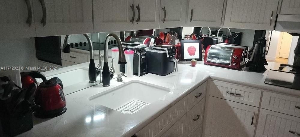 Quartz counter tops with lights above so at nite easy to see