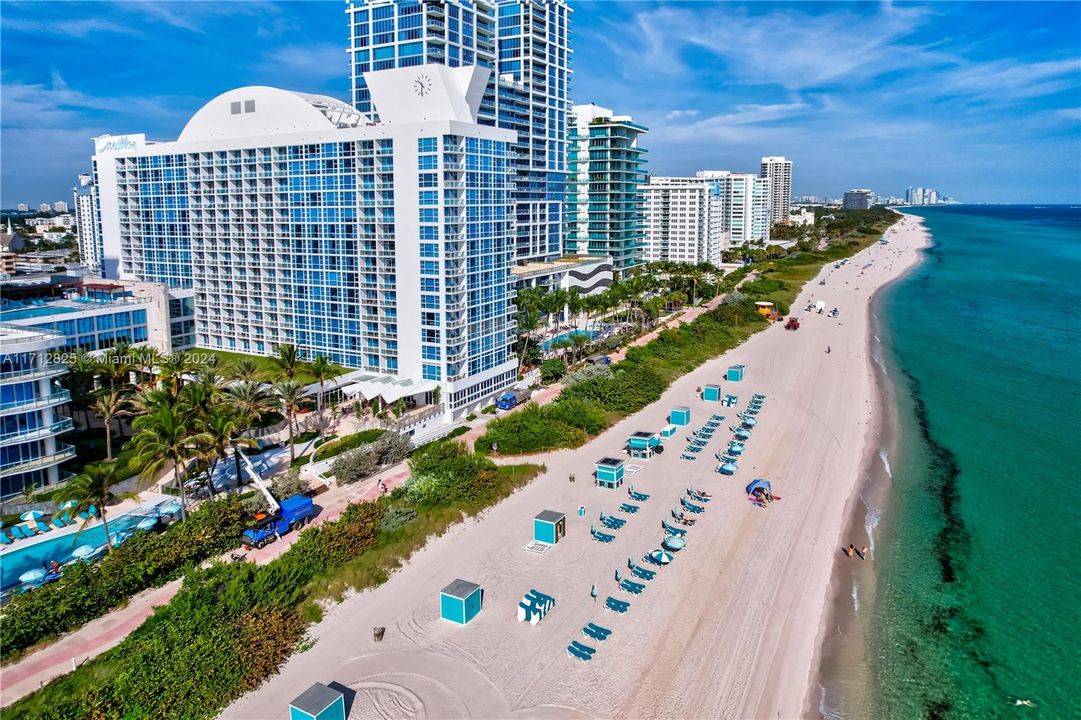 Beach Club for residents, owners and guests to enjoy oceanside/poolside dining as well as chaise lounges with umbrellas and bar service.