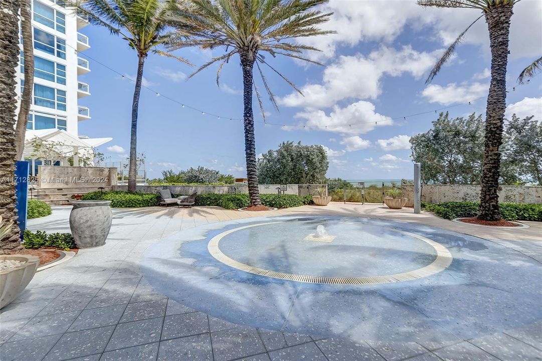 Courtyard adjacent to Boardwalk and Beach access from Hotel/Condo.