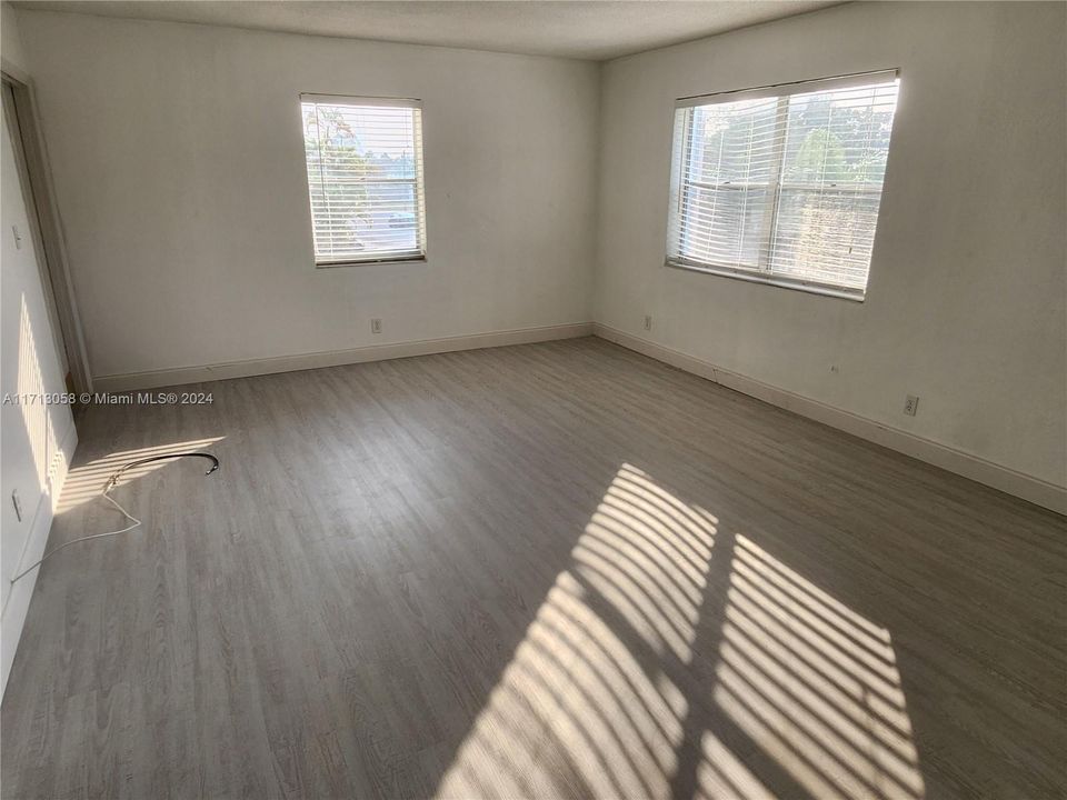 Living room has plenty of natural light.