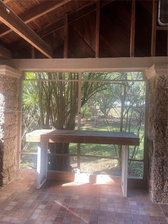 Screen Porch w Space for your favorite Plants and more!