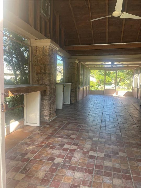 Screened patio with Coral rock embellishments