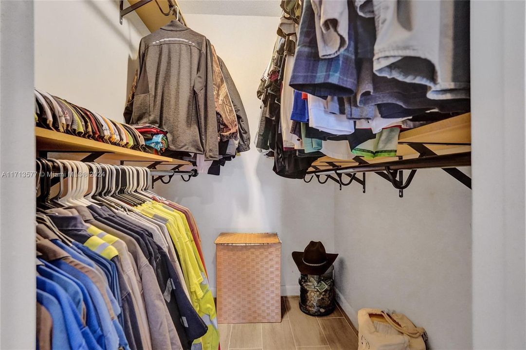 Walk in closet in primary bedroom