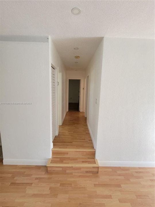 HALLWAY TO BEDROOMS