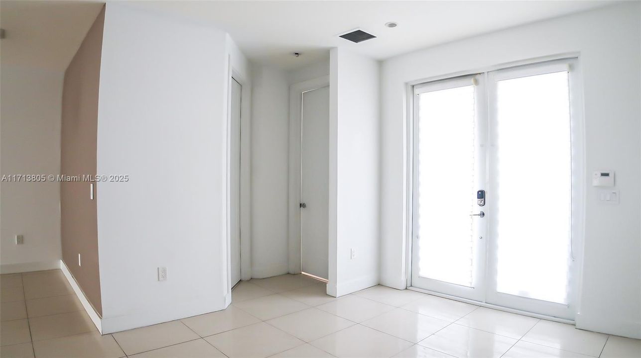 Entry Foyer , First Floor Bedroom and Full Bathroom