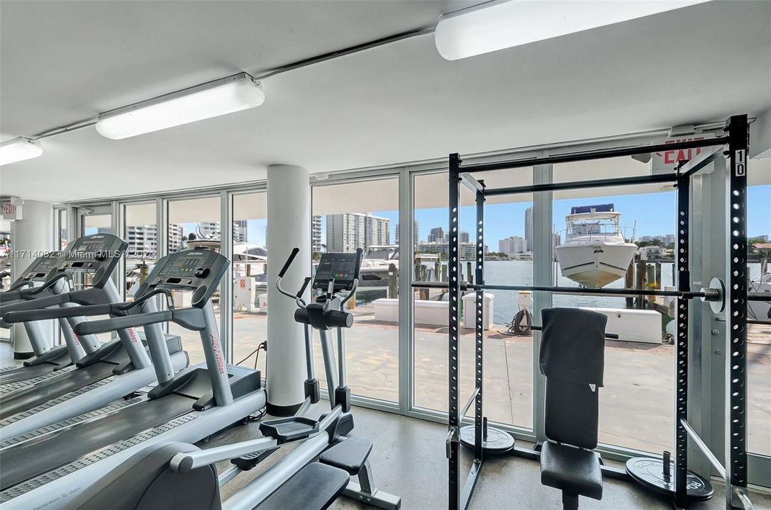 Well equipped gym is bright and sunny and overlooks the waterfront. You will be pumped for your intense workout routine always!