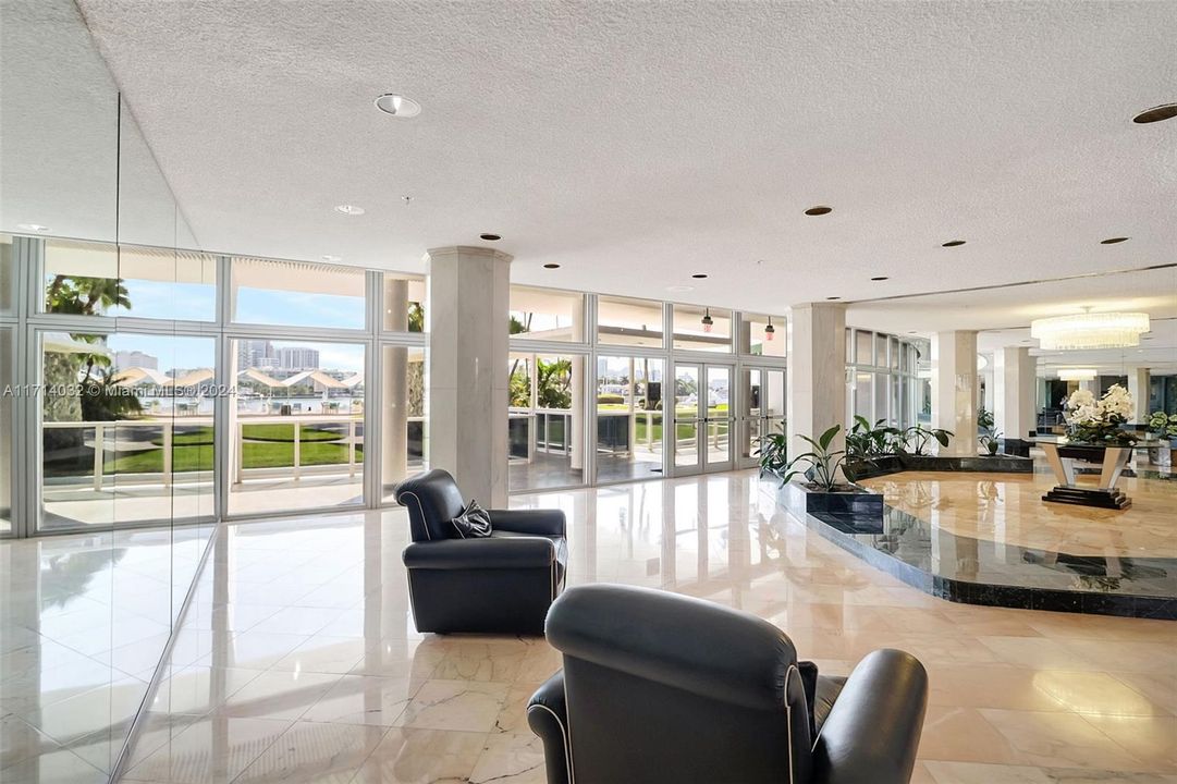 Luxurious original antique marble floors as found in impressive lobby.