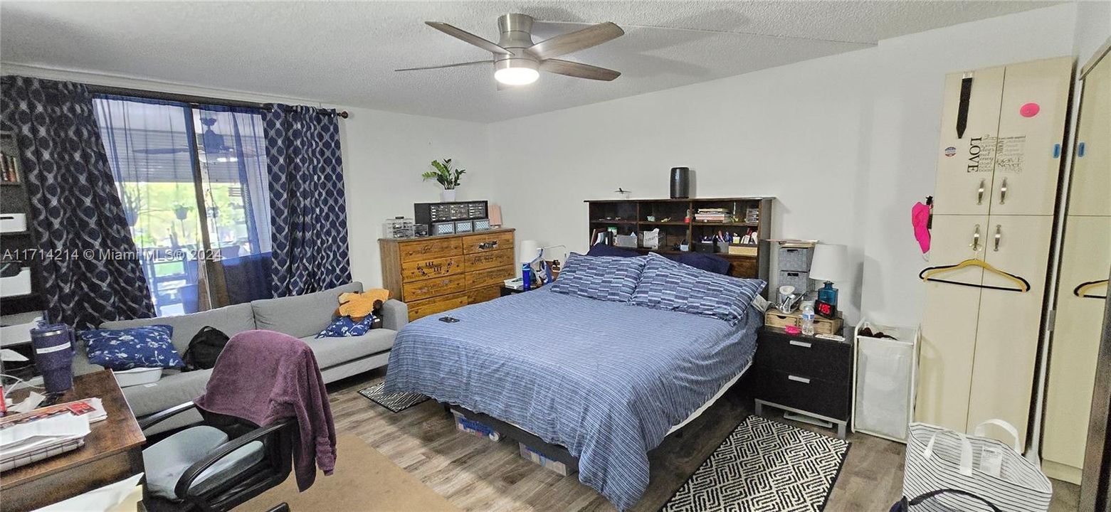 Large bedroom with balcony access