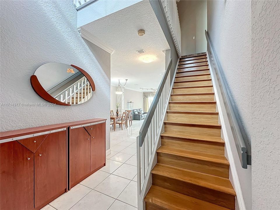 entrance to 1st floor and stairway to 2nd