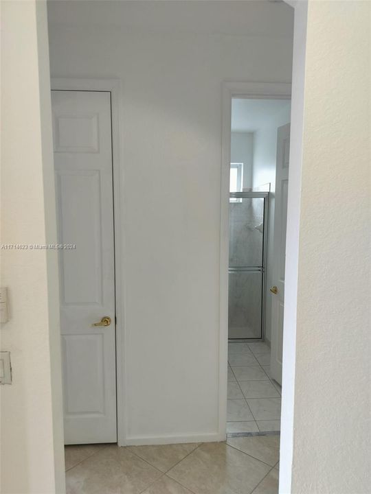 Hallway to First Bedroom & Bathroom