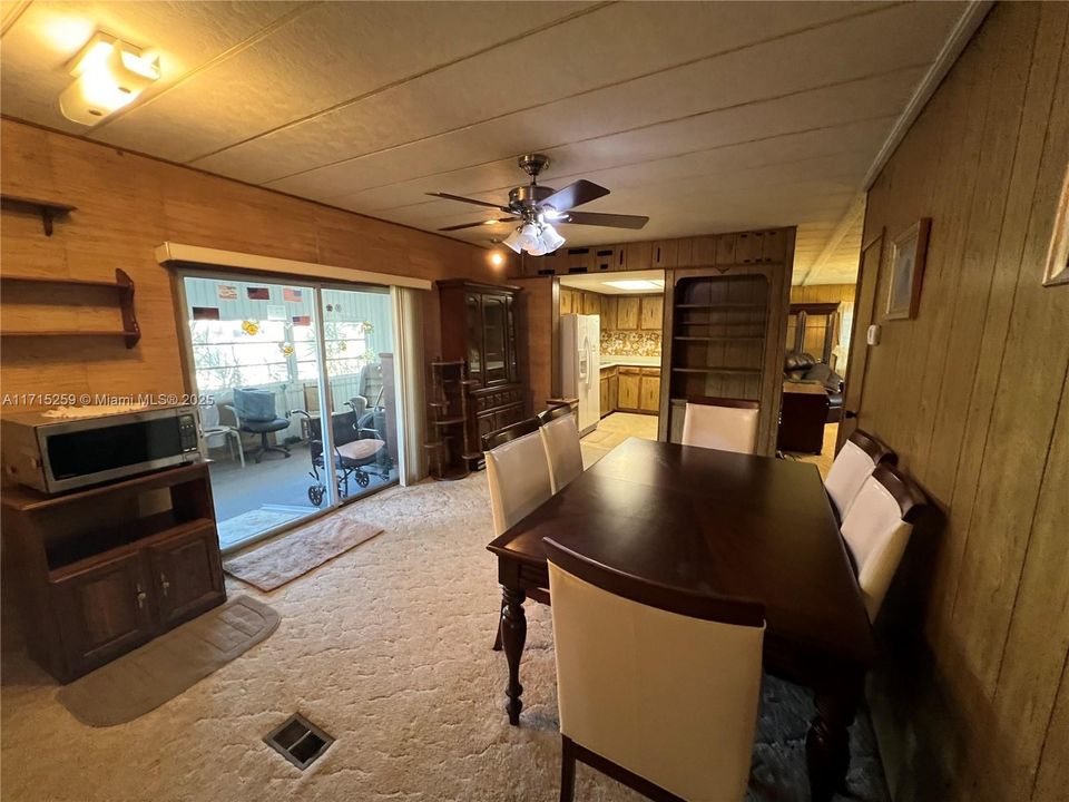 Used as a dining room- Sliding doors to patio