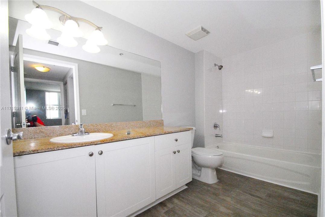 RENOVATED BATHROOM WITH TOP-OF-THE-LINE CERAMIC FLOORS