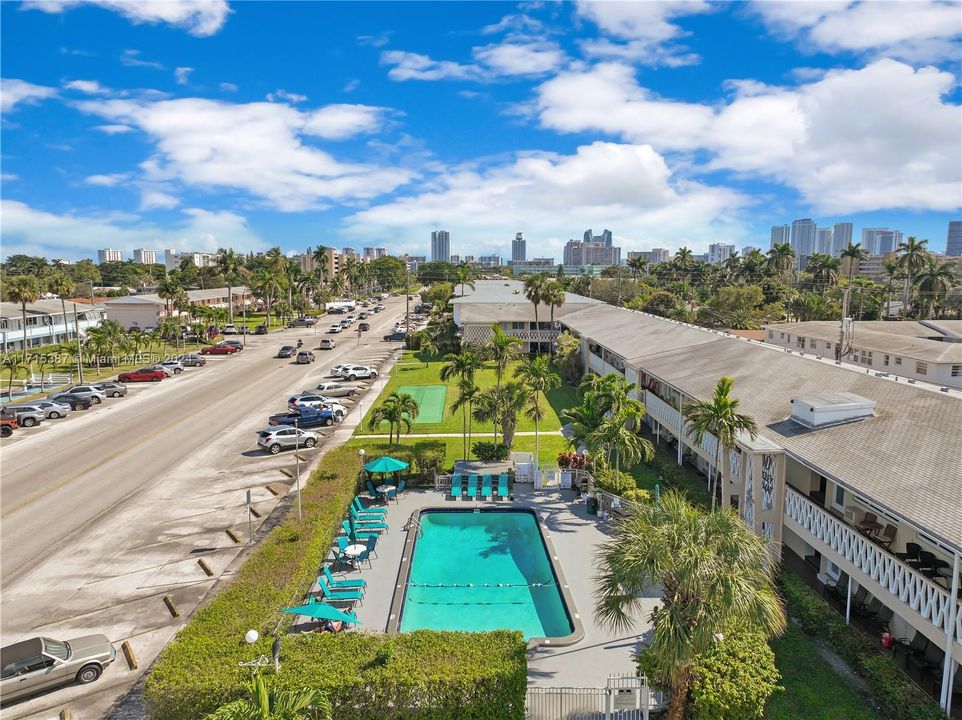 SIDE VIEW OF POOL & PARKING