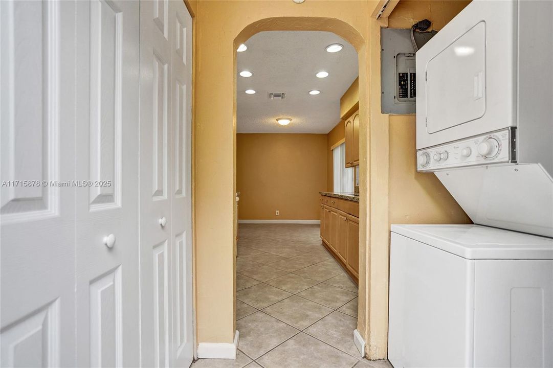 Laundry room facing kitchen