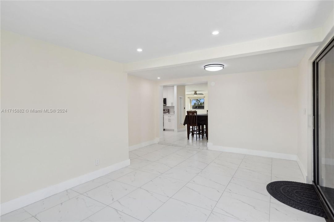 Family room looking at kitchen and dining area