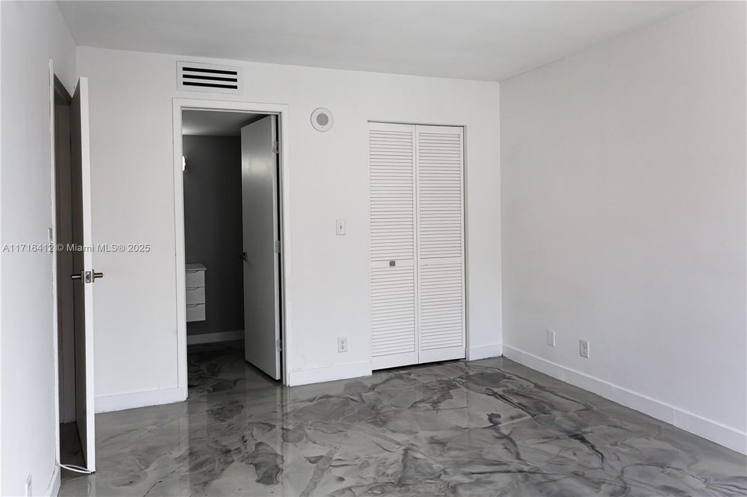 Master Bedroom with a walk-in closet and master bath