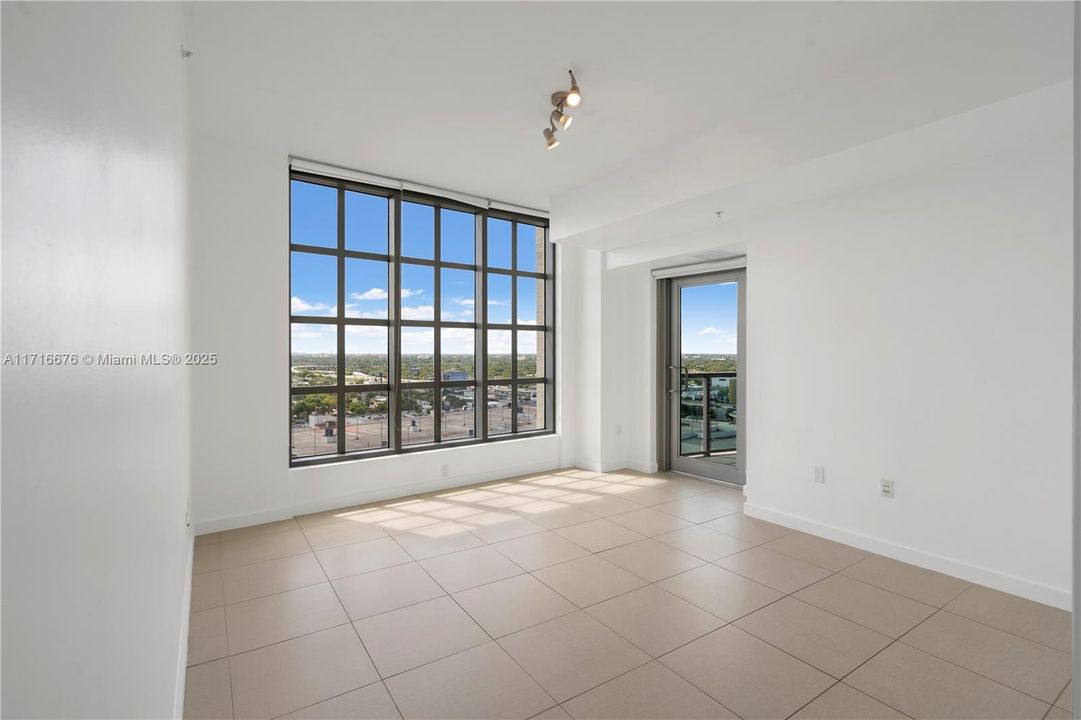 Primary Bedroom has direct access to balcony