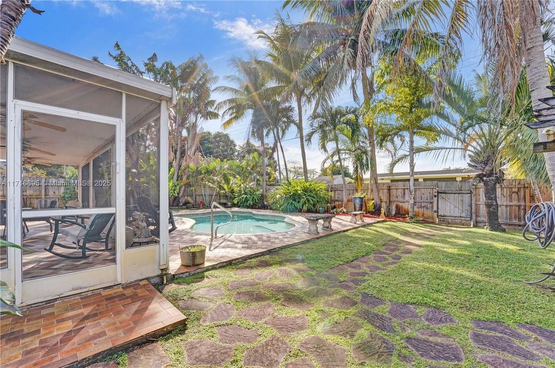 Step out into matching tile stones to Pergola