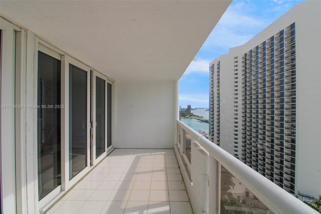 Balcony accessible from both living and bedroom.