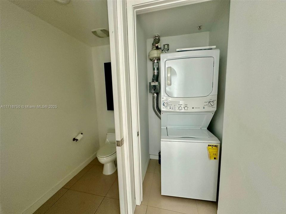 Laundry and additional half bathroom