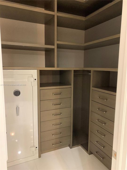 Walk-in closet in master bathroom