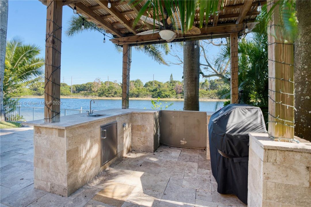 cooking area with sink