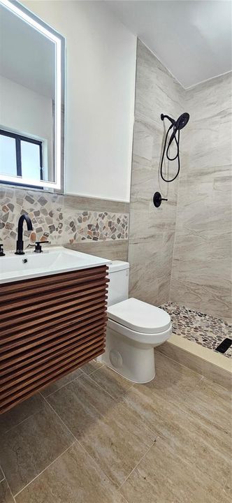 master bathroom, shower and LED mirror.