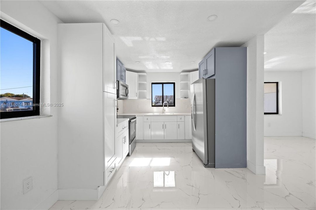 View of the kitchen from the dining area.