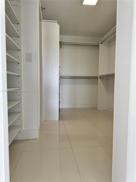 Generous Primary walk in closet with tons of storage