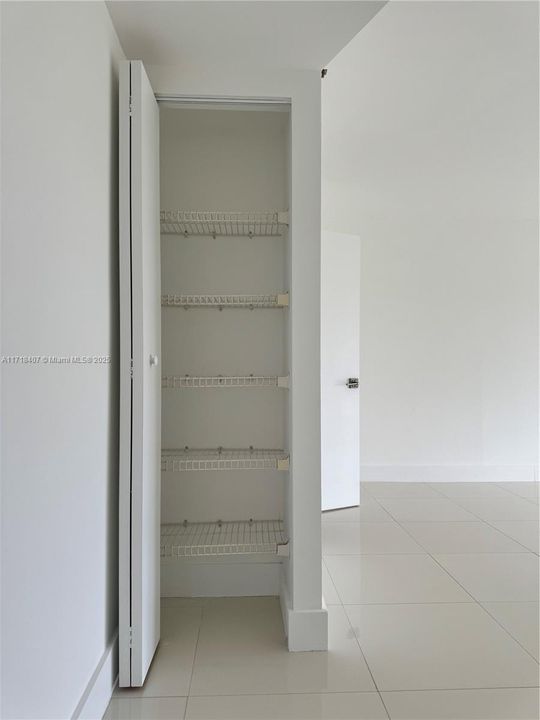 Linen closet in Primary bedroom en-suite