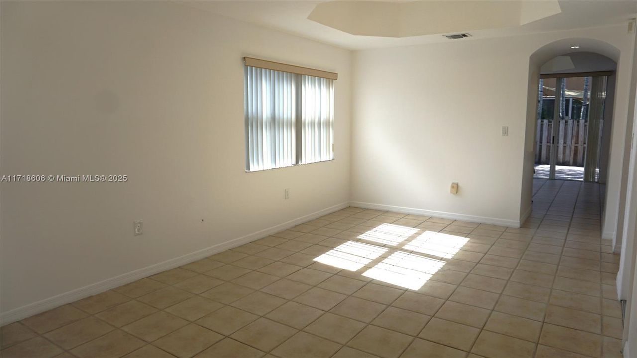 Entry to spacious and bright Living/Dining room.