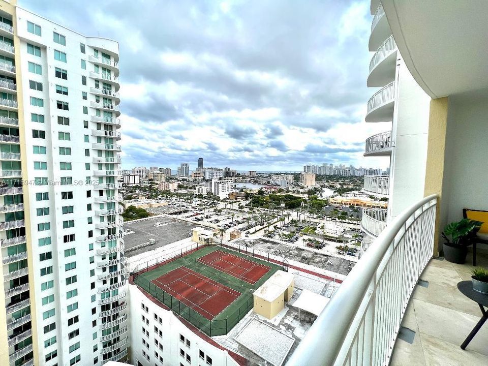 City/Tennis Courts View from the Open Balcony