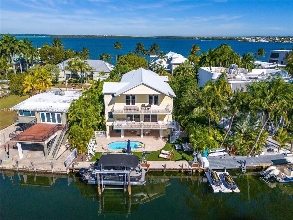House has  canal and bay views.