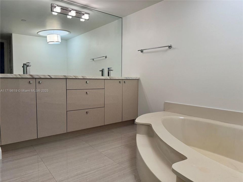 Primary with Soaking Tub and separate Shower plus double sinks