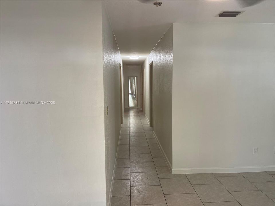 Hallway leading to all 4 bedrooms