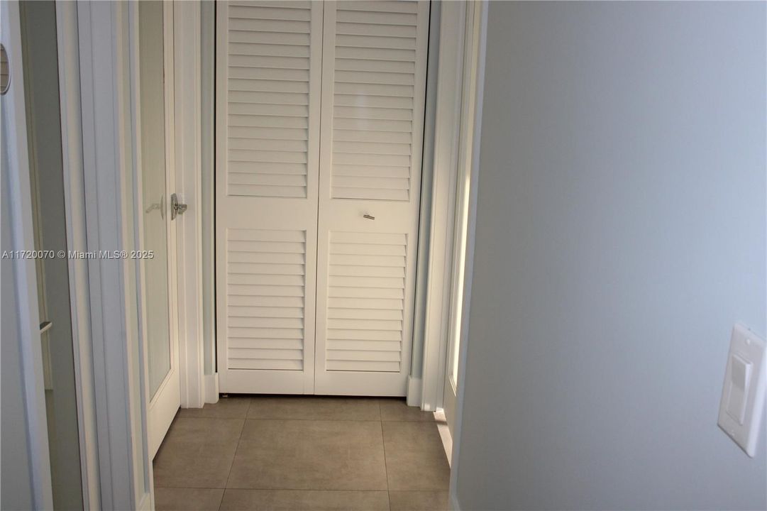 HALLWAY TO BEDROOMS, LINEN CLOSET