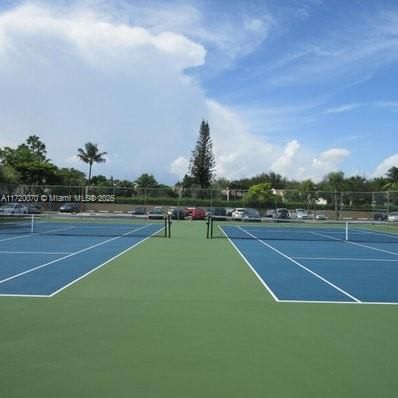 4 TENNIS COURTS IN COMMUNITY