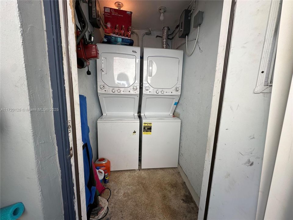 Laundry room has private washer/dryer for this unit only plus extra storage