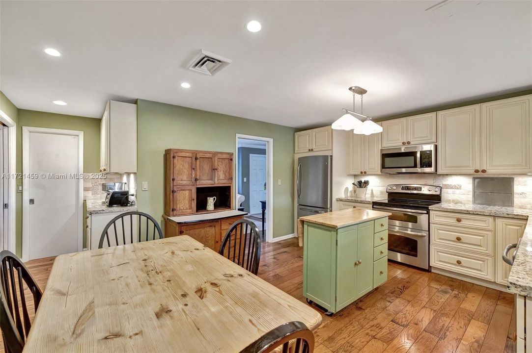 Comfortable updated kitchen with large walk in pantry and butlers serving area to stage for parties or make your morning coffee