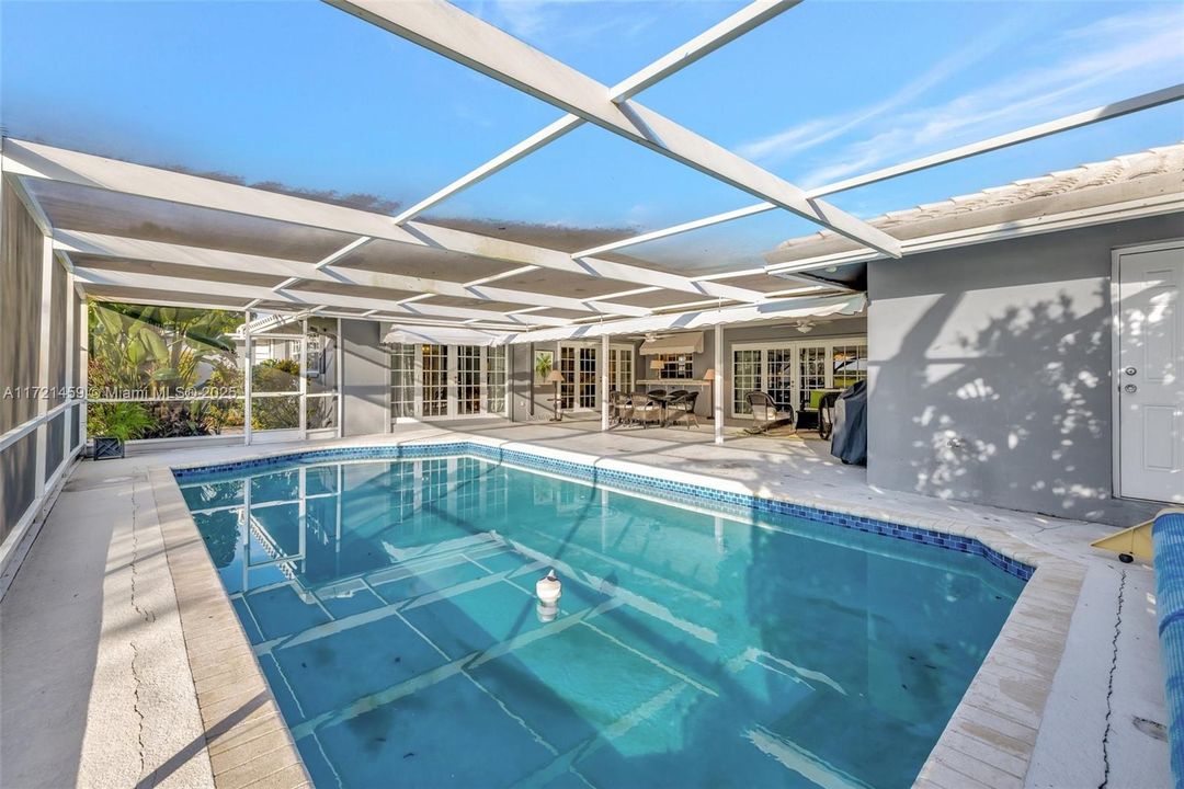 Large Pool with covered patio and awnings - great place to entertain