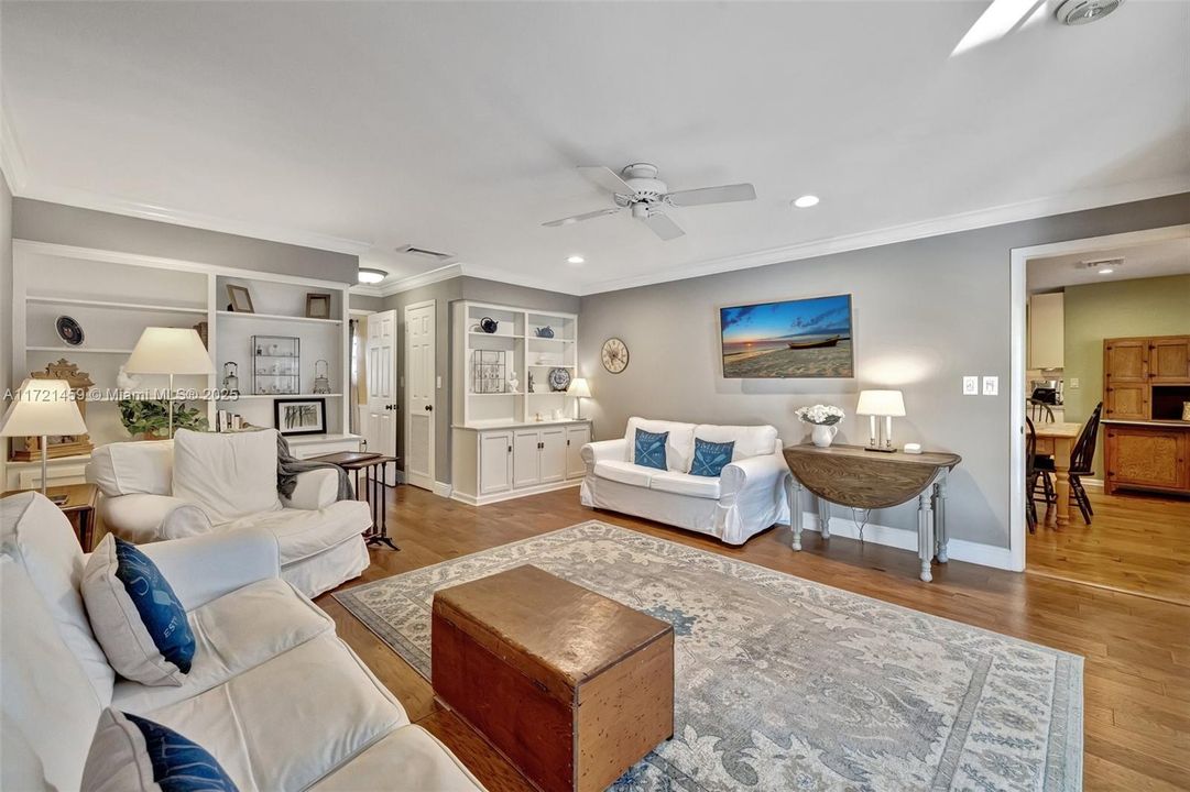 View from family room to the kitchen. Plenty of space for a large TV