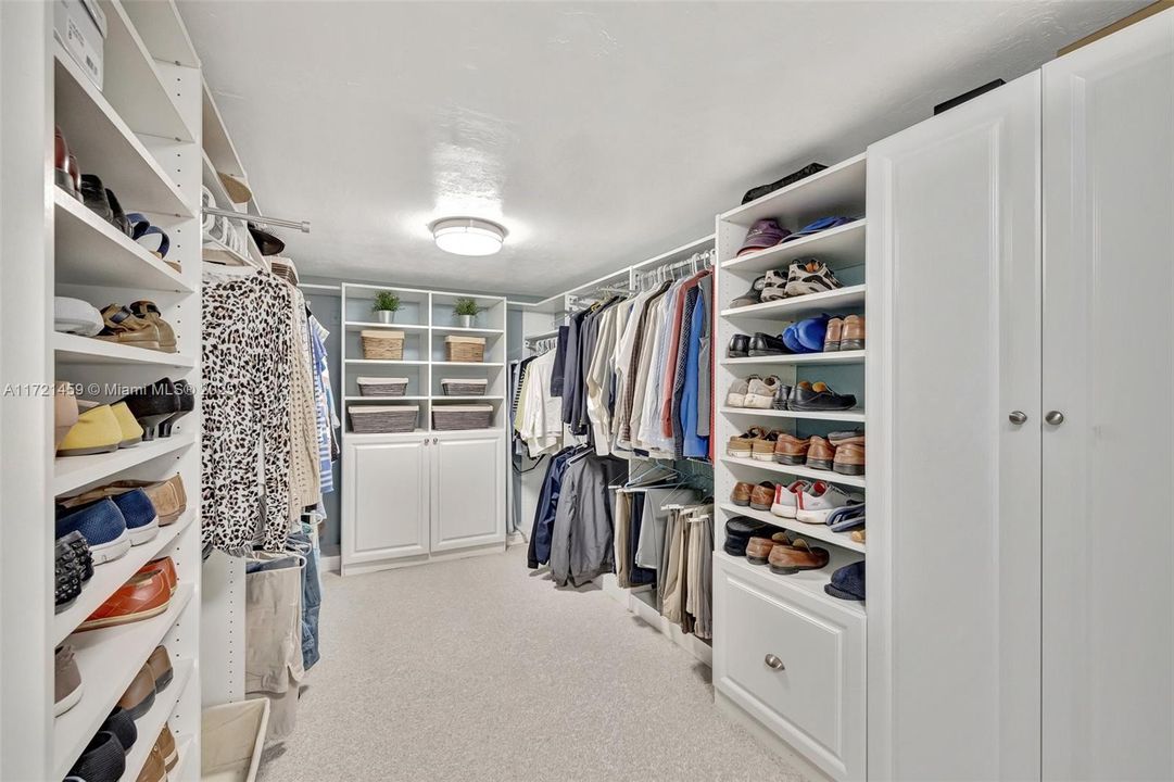 HUGE Primary Closet with tons of built ins