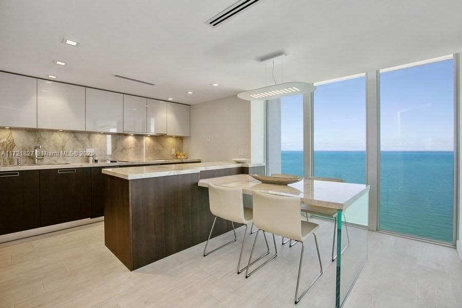 OPEN KITCHEN AND DINING AREA