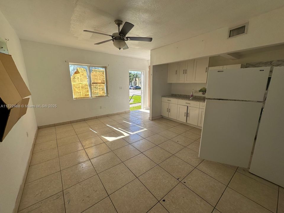 Living room #2 - located to the right of entry.(kitchen must be undone)