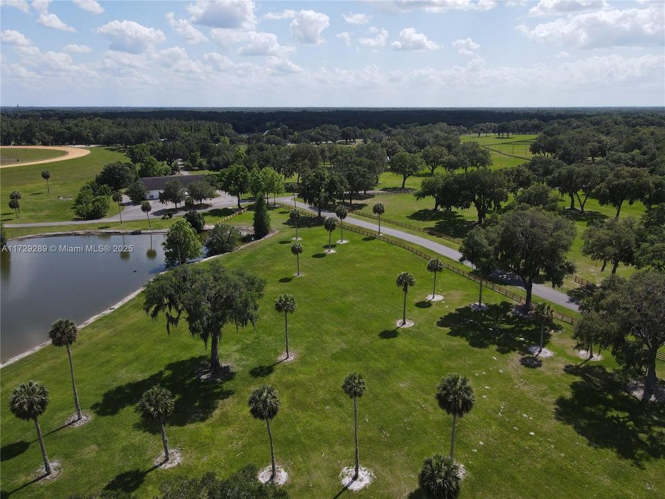 Areial view of property to the right of the lake to include 1/3 owernership of lake
