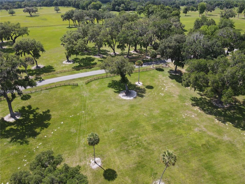 Arial view of property entrance. Well is located upper right corner about 15 feet from power which is at property line.