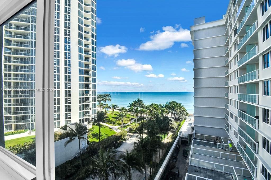Modern high-rise with direct beach access in Sunny Isles. Enjoy skyline views, tropical landscaping, and steps to Collins Ave amenities.
