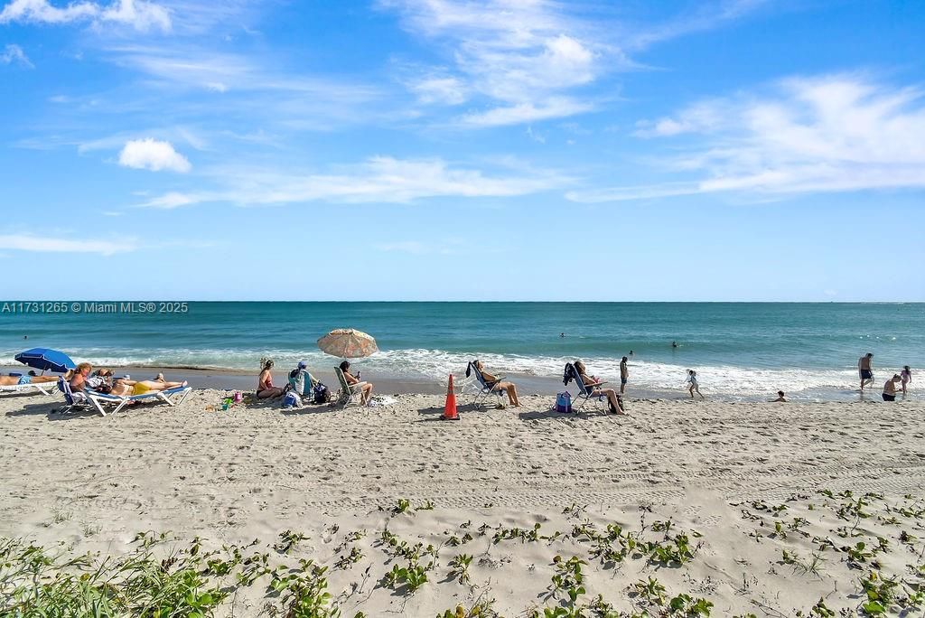 Unobstructed oceanfront view of Sunny Isles Beach—crystal-clear waters, sandy shores, and endless blue skies.