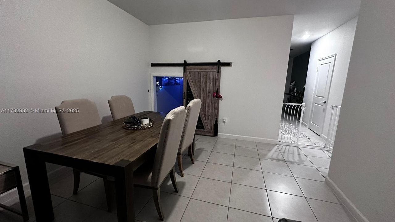 Storage under the stair with barn door