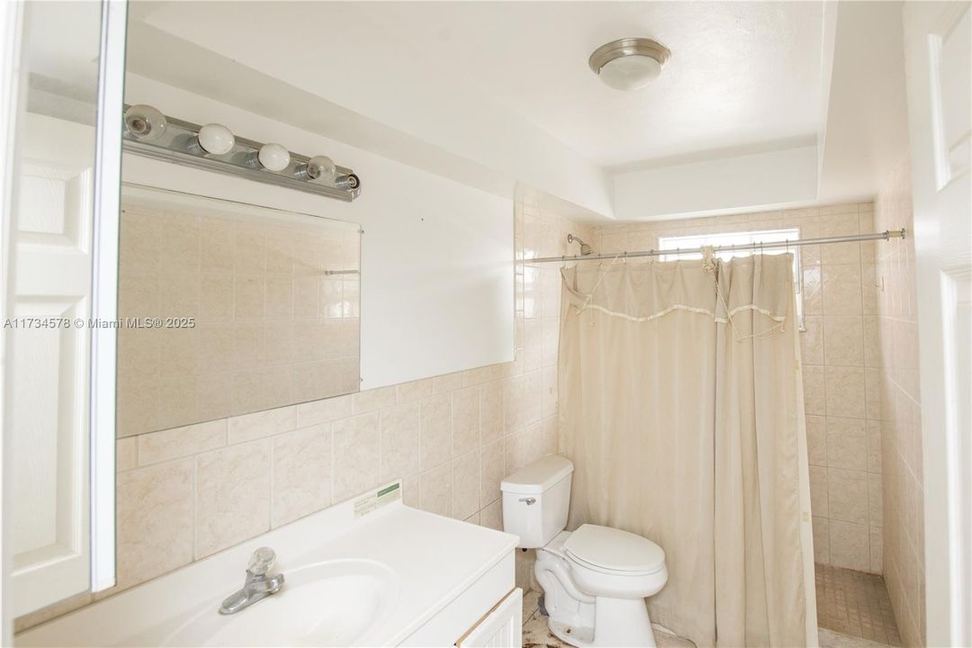 In abandoned house on property